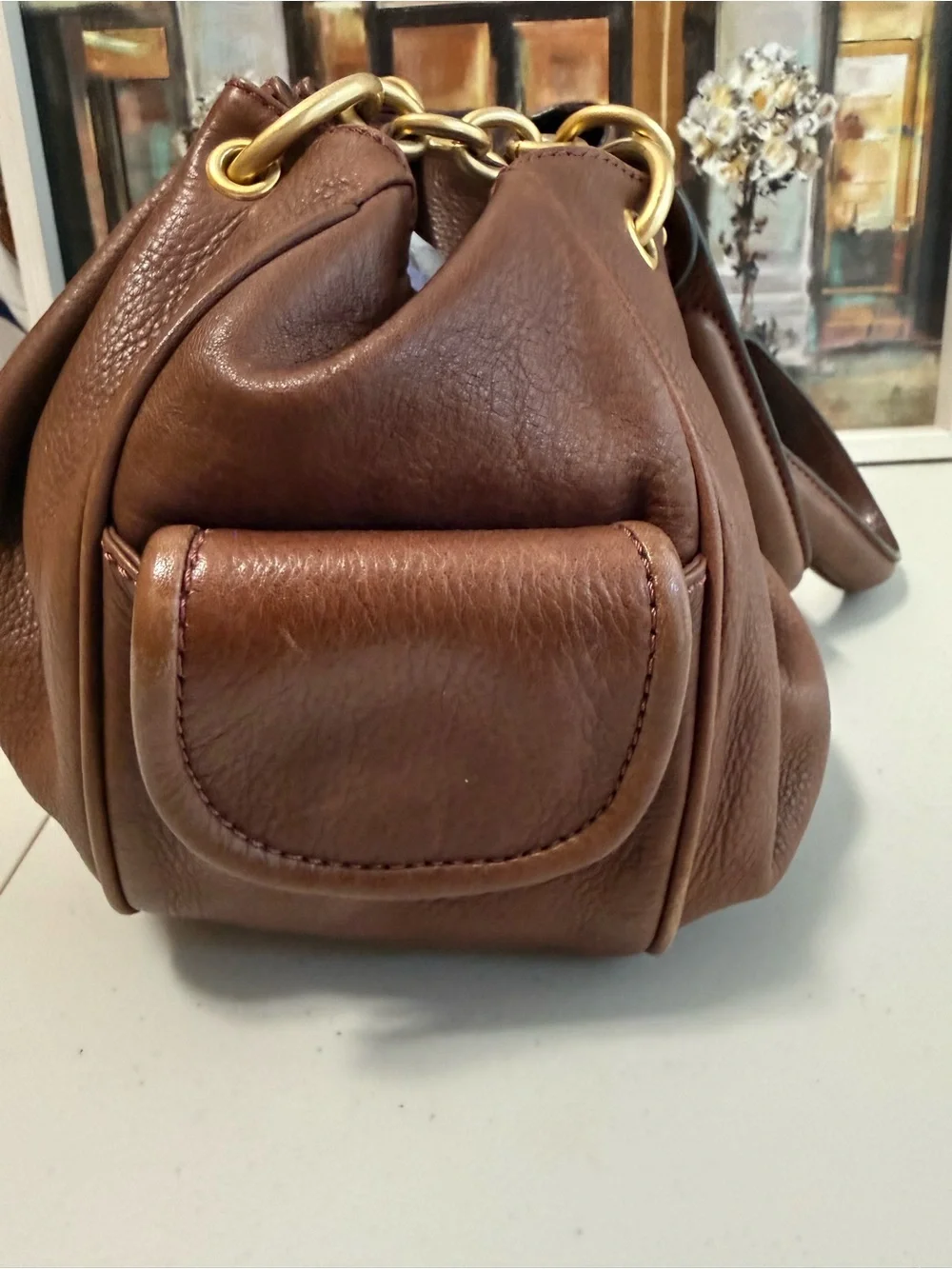 Juicy Couture Brown Leather Shoulder Bag with Gold Chain Accents